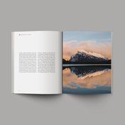 The Book of Romans soft cover mountains sky view